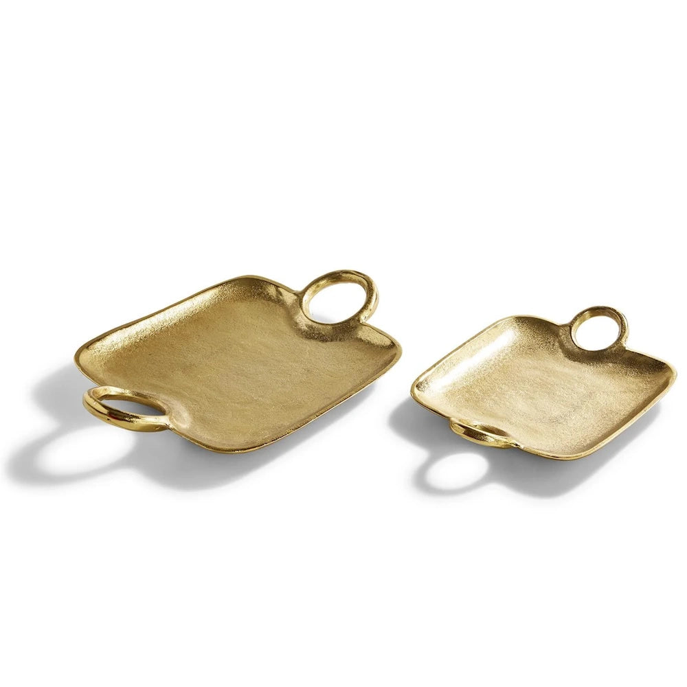 Set of 2 brass-gold decorative trays featuring a textured metallic finish and integrated circular handles.