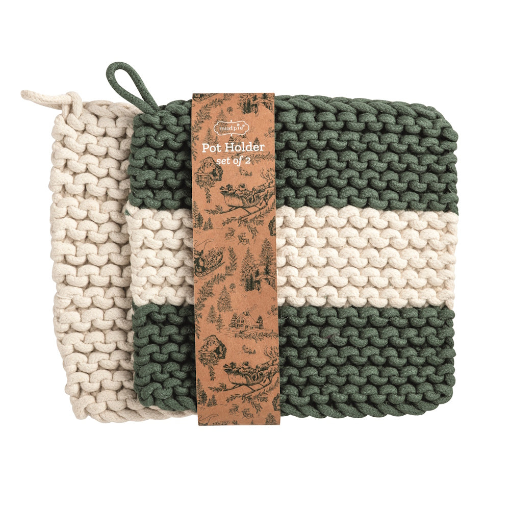 Set of two woven pot holders featuring thick green and white stripes, bundled with a holiday-themed paper band.