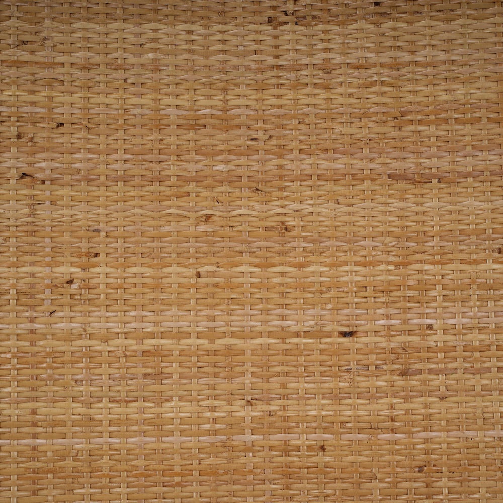 Close up detail of the natural woven rattan material used on the Milano dining chair backrest.