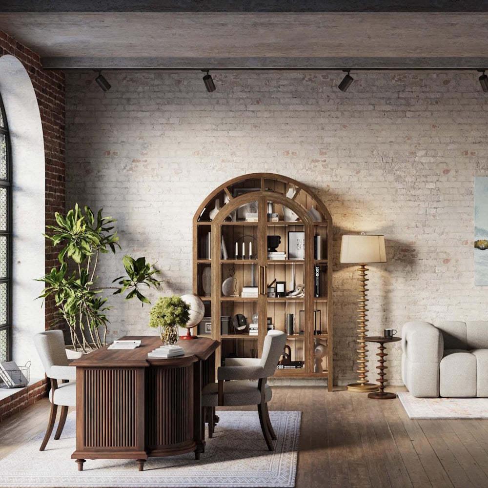 Milano round wooden side table next to a sofa and floor lamp in an industrial loft home office.