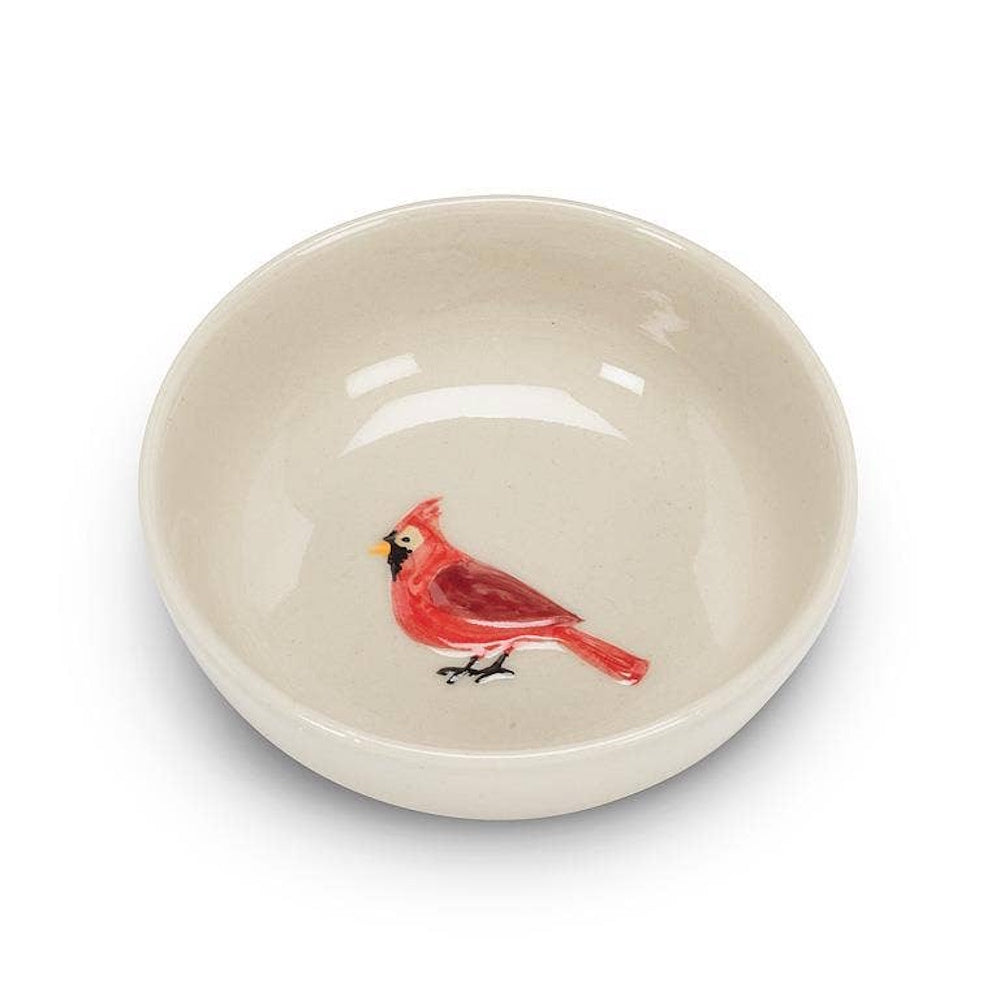 Small cream-colored ceramic bowl with a hand-painted red cardinal illustration in the center.