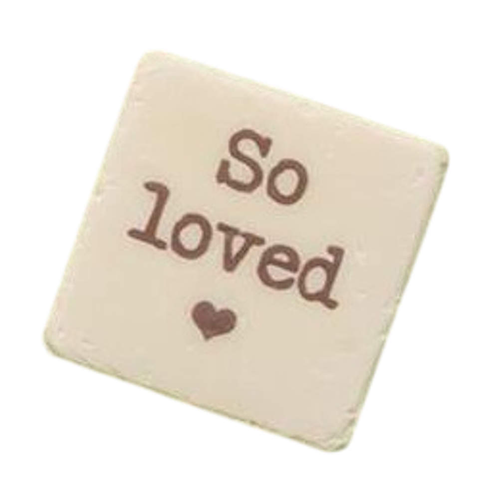 Cream square stone magnet with a small heart and "So loved" text in brown typewriter font on a black background.