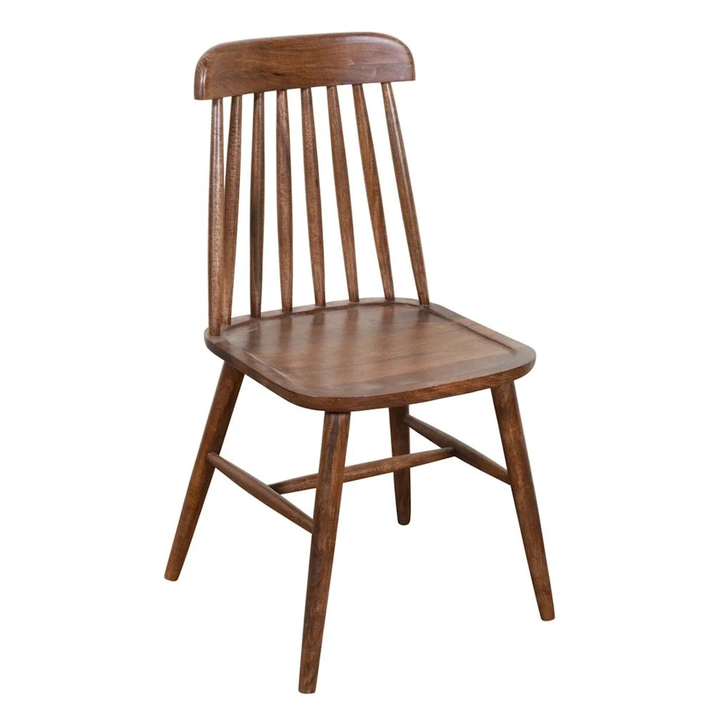 Mid-century modern walnut finish wood spindle back dining chair with tapered legs.