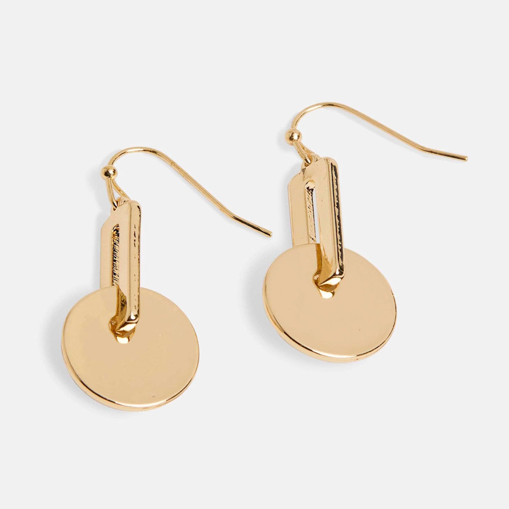 Modern gold dangle earrings featuring a flat polished disc hanging from a rectangular geometric link on fishhook wires.