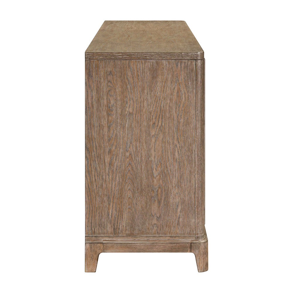 Side view of the wooden accent cabinet showing the wood grain finish and tapered legs.