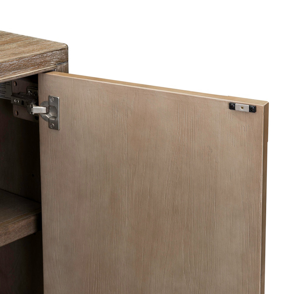 Close-up of the wooden cabinet door interior showing the metal hinge and magnetic catch hardware.