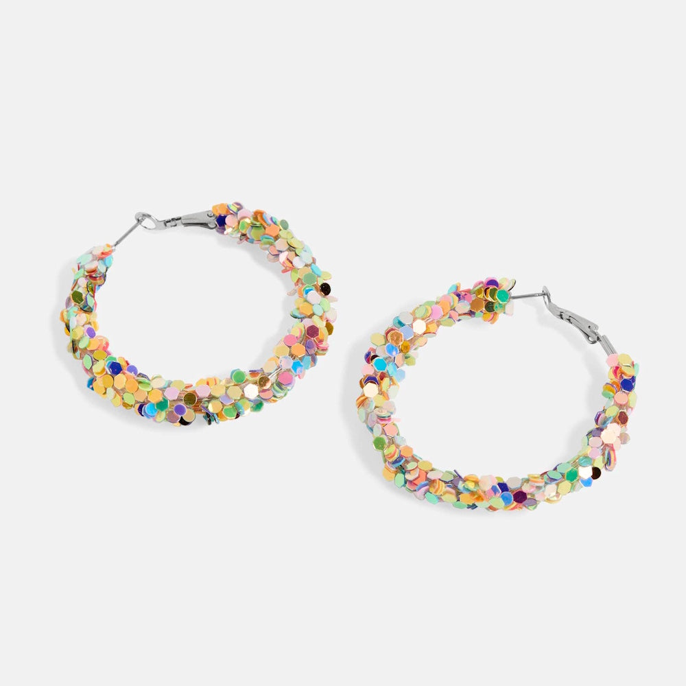 Multicolor confetti shimmer hoop earrings featuring vibrant, round sequins on a silver-tone frame for a festive look.