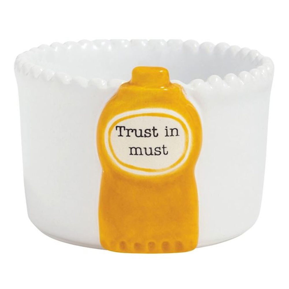 White ceramic dip bowl with a beaded rim and a yellow mustard bottle illustration reading "Trust in must."
