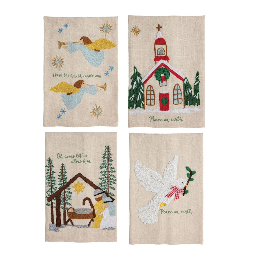 Four beige embroidered Christmas towels featuring angels, a church, a manger scene, and a peace dove.