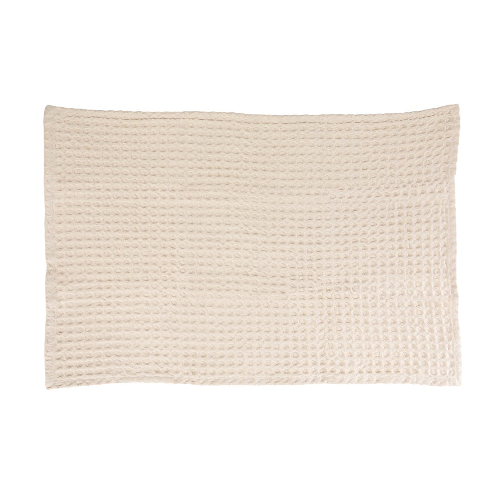 Front view of a natural stonewashed cotton waffle weave tea towel.