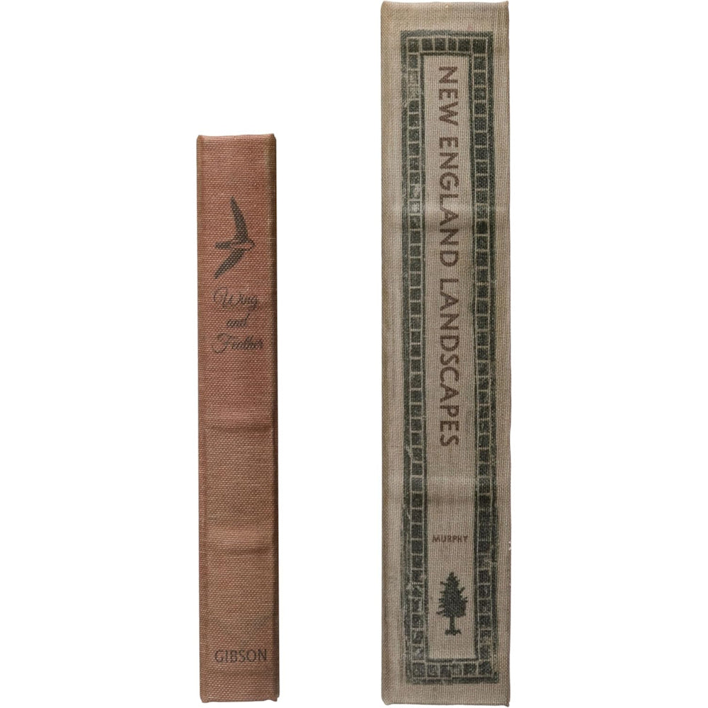 Vertical view of book spines for Wing and Feather by Gibson and New England Landscapes by Murphy.