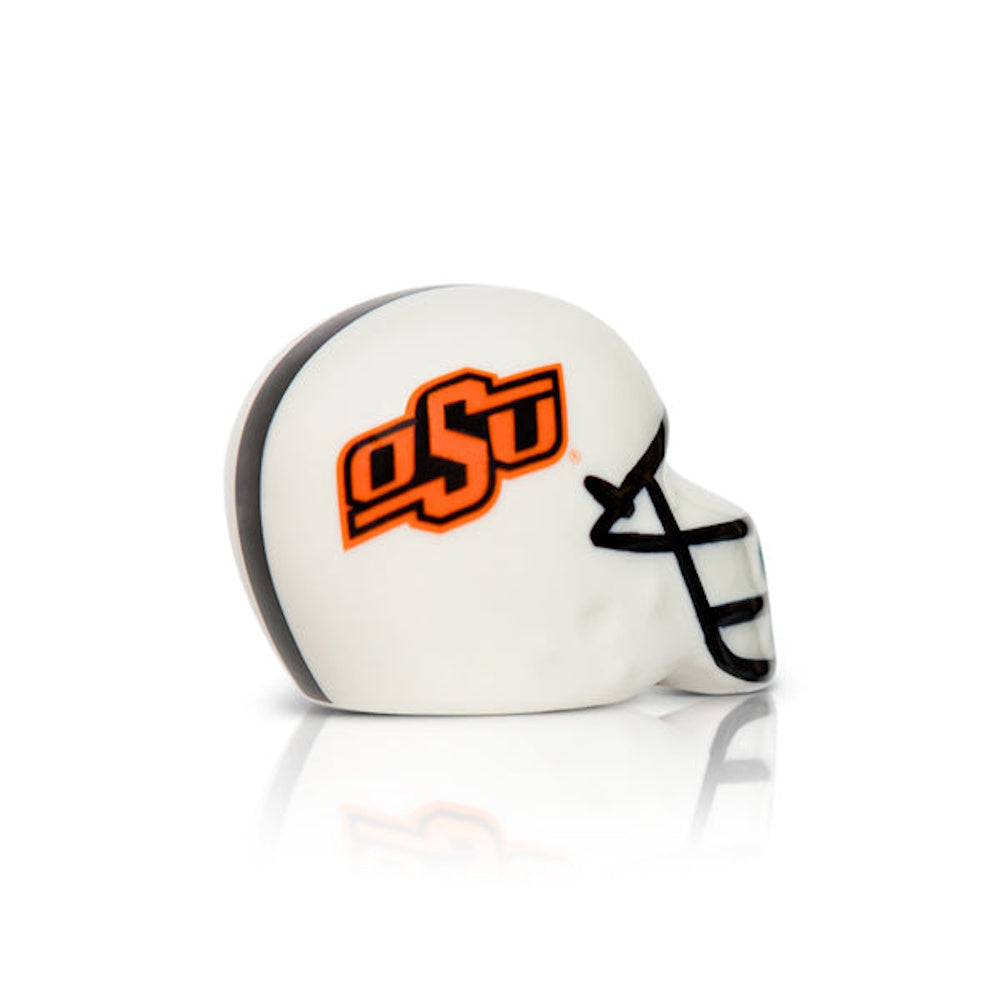 A small ceramic Oklahoma State University football helmet figurine with an orange OSU logo on white background.