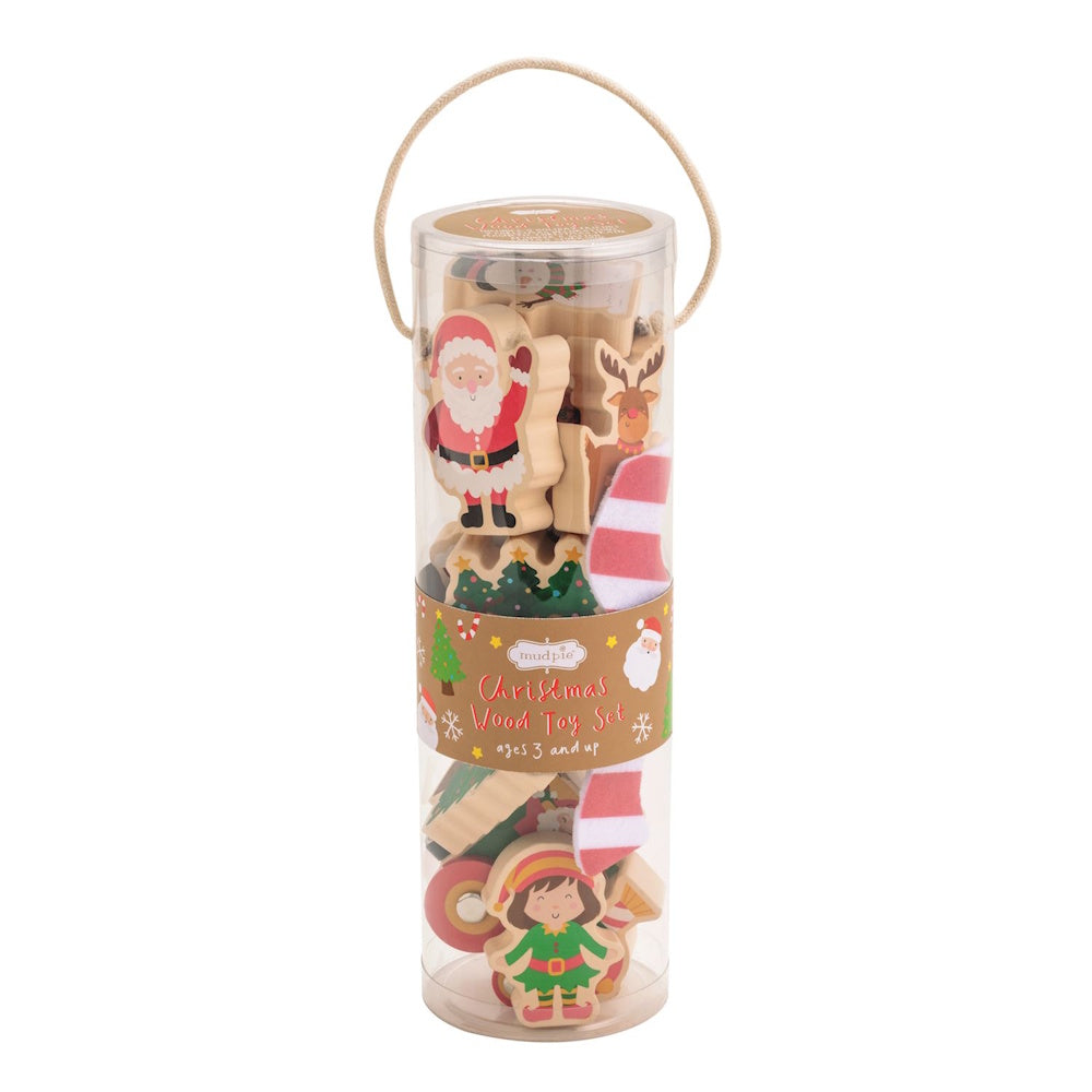 Christmas-themed wooden toy set inside a clear cylindrical container with a rope handle.