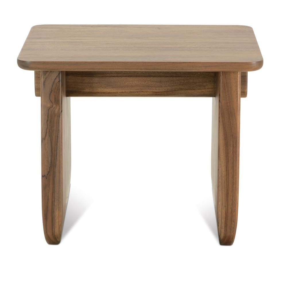 Front view of modern walnut end table with rounded rectangular top, sculptural panel legs and clean lines design.