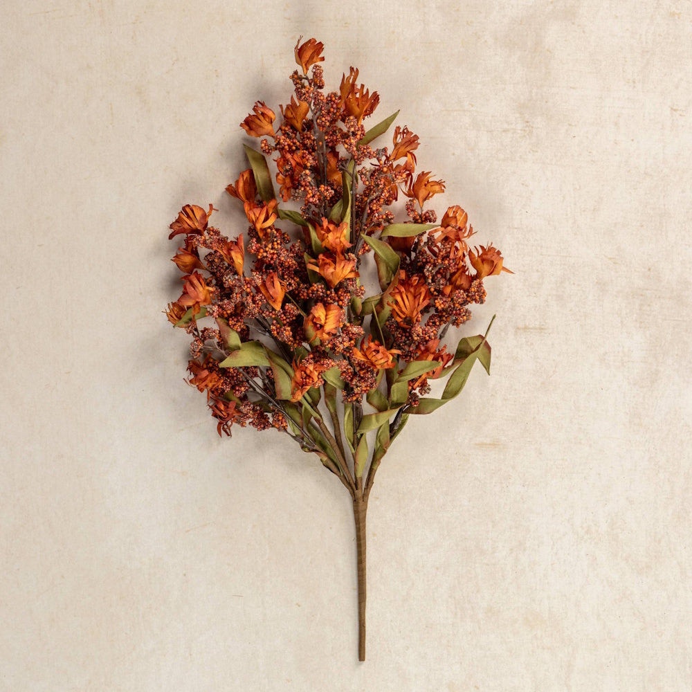 Artificial orange wildflower bush with mini berries and leaves for autumn home decor.