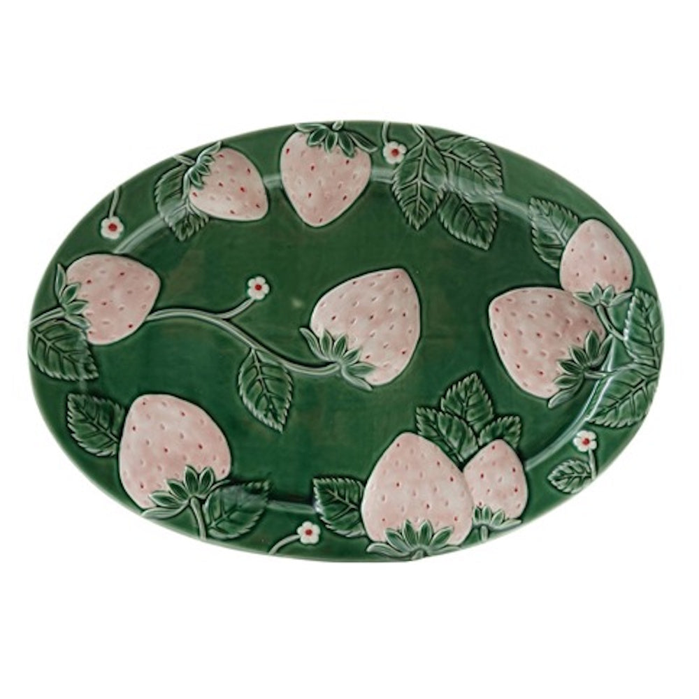 Oval green stoneware platter with embossed light pink strawberries, green leaves, and small white flowers.