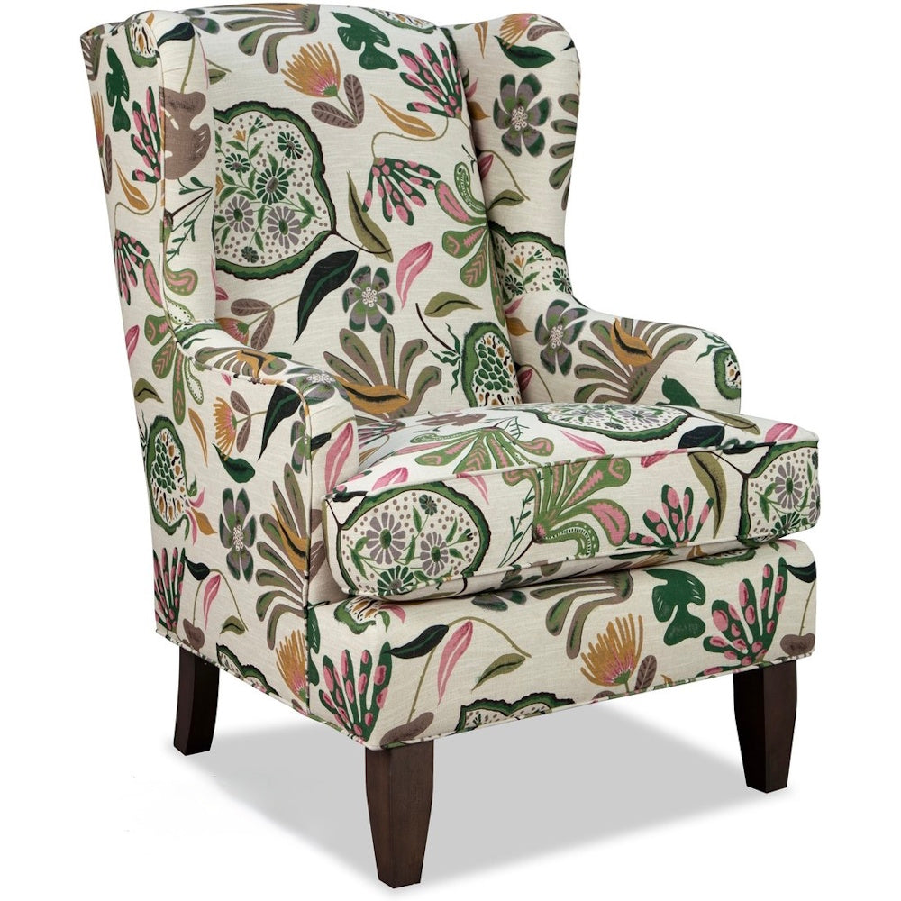 Floral wingback armchair upholstered in a colorful botanical print with dark wooden legs.