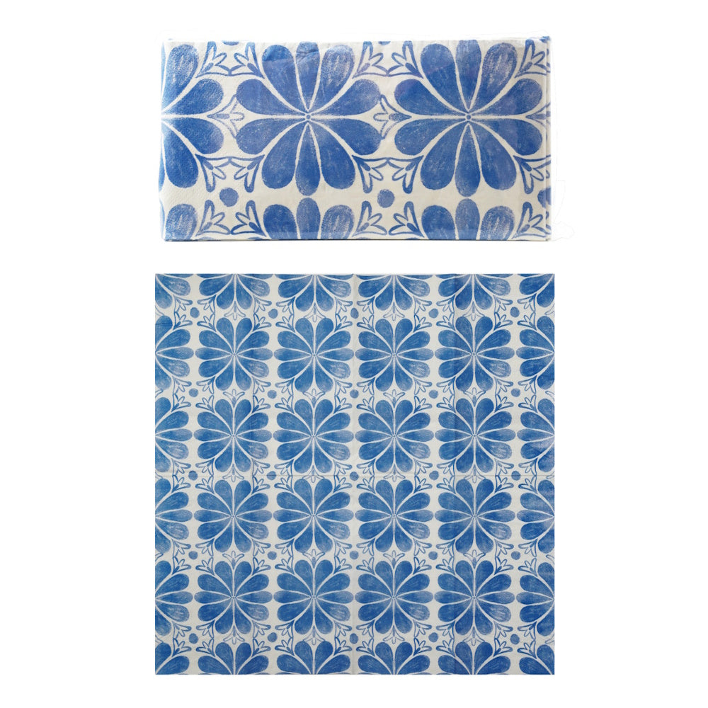 Blue and white paper napkins featuring a Mediterranean tile floral pattern.