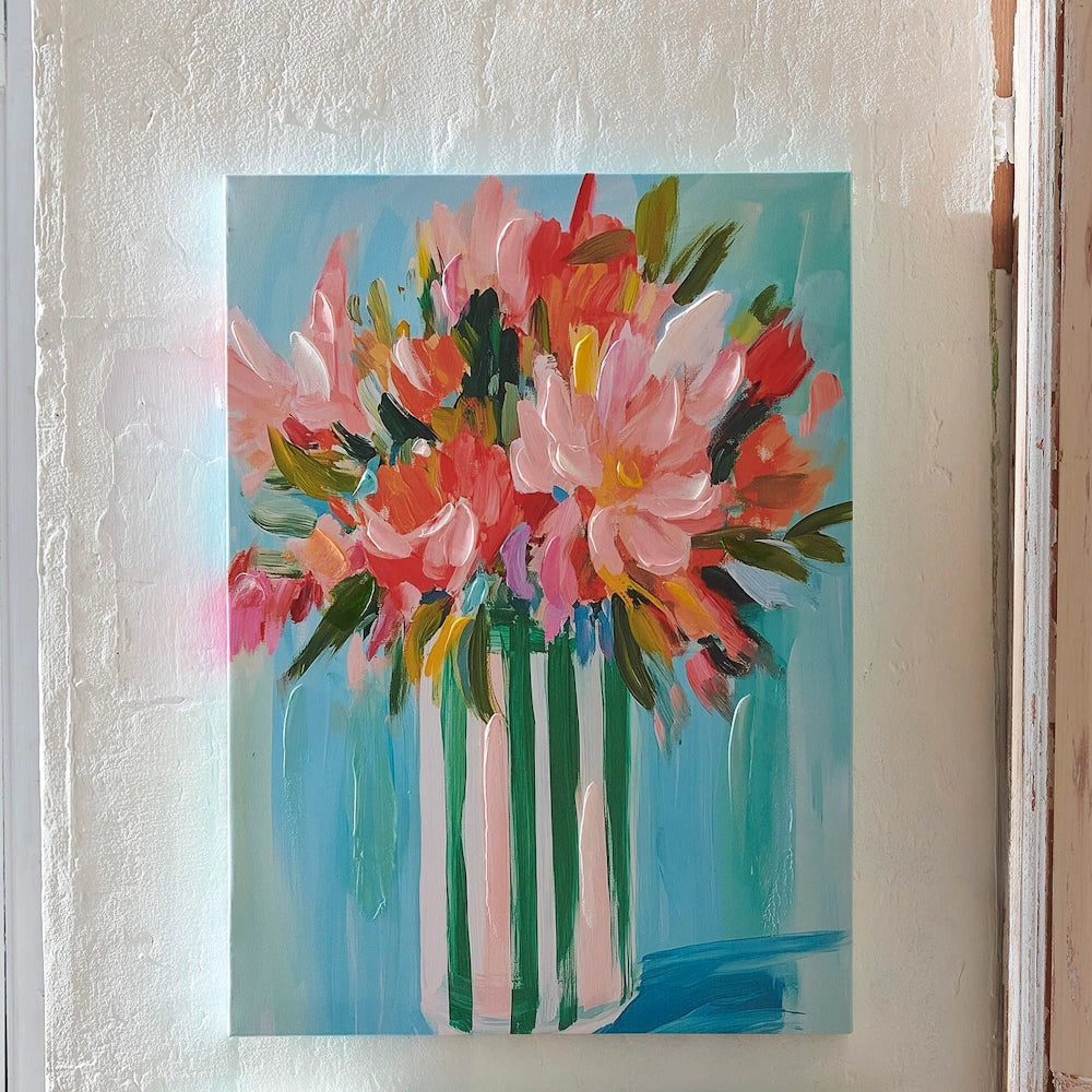 Abstract palette knife painting of pink and orange flowers in a striped vase against a light blue background.