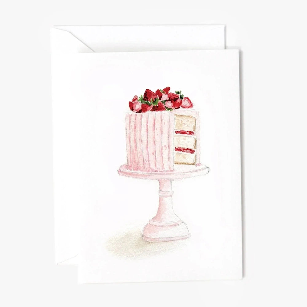 Watercolor illustration of a sliced pink strawberry cake on a stand on a white notecard.