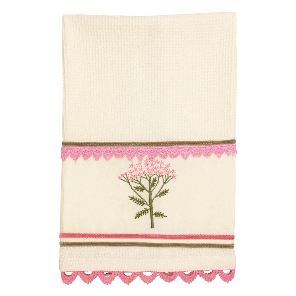 Cream waffle-weave hand towel featuring pink floral embroidery, scalloped lace trim, and decorative velvet ribbon accents.