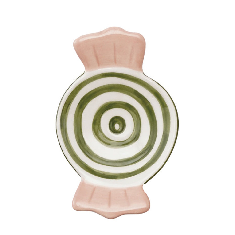 Candy-shaped ceramic dish featuring green concentric circles and pink wrapper-style ends.