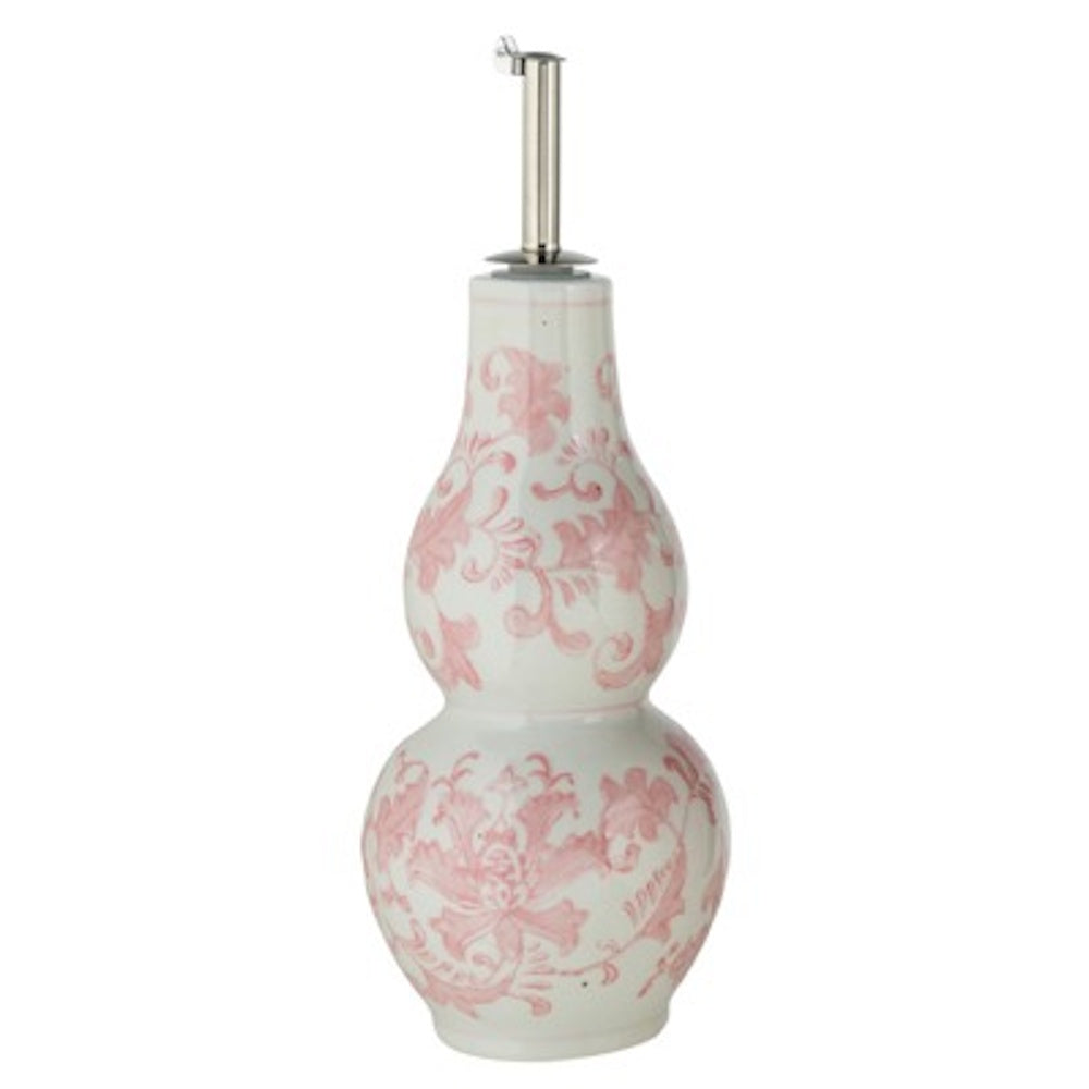 Hand-painted stoneware oil cruet with a pink floral design, gourd-shaped body, and a stainless steel pour spout.