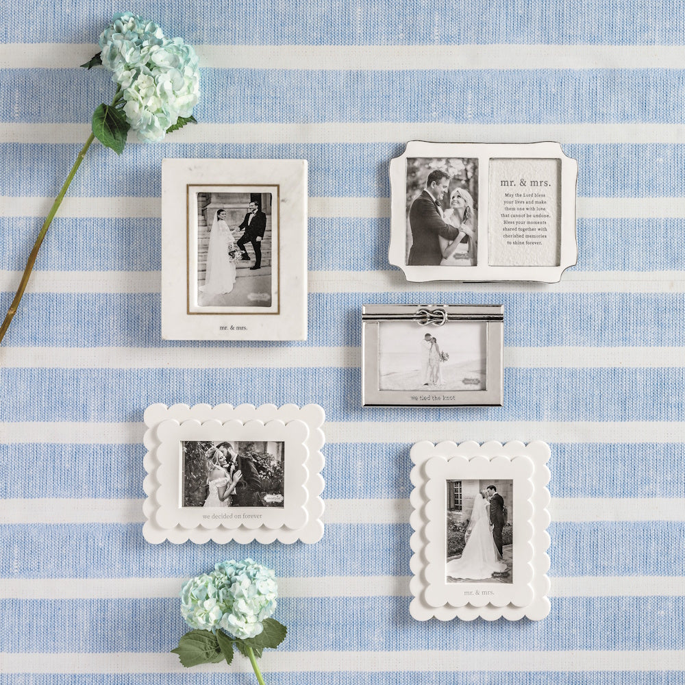 Five assorted wedding-themed picture frames featuring black and white photos on a blue and white striped background.