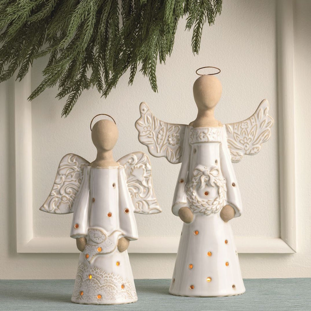 Two white light-up ceramic angel figurines with wire halos and lace-textured details in two sizes.
