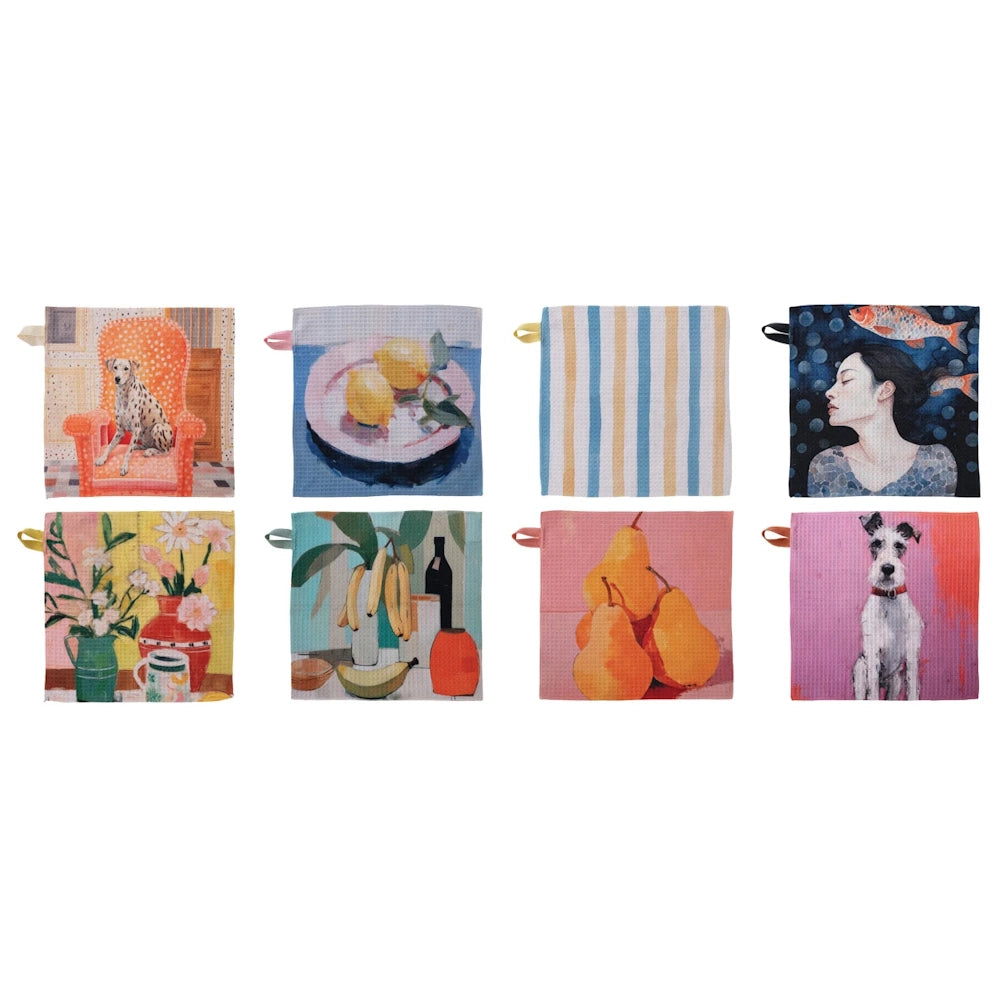 Assorted recycled microfiber dishcloths featuring colorful prints of dogs, fruit, floral still lifes, and artistic portraits.