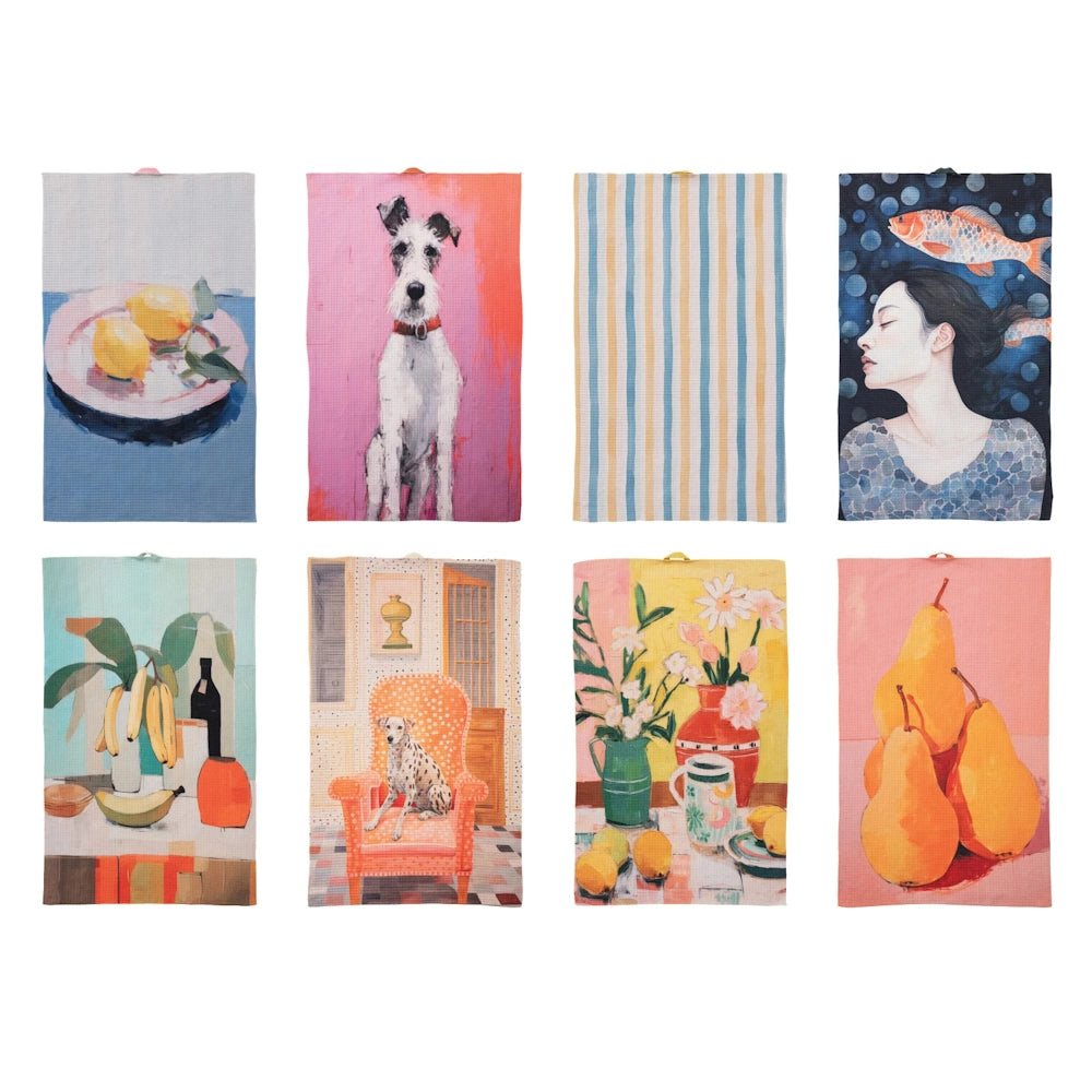 Assortment of artistic tea towels featuring lemons, dogs, floral still lifes, fruit, and a woman with fish.