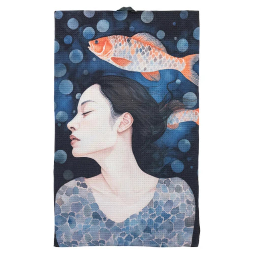 A profile view of a woman underwater with an orange koi fish, featuring a blue bubble background on a waffle-weave tea towel.