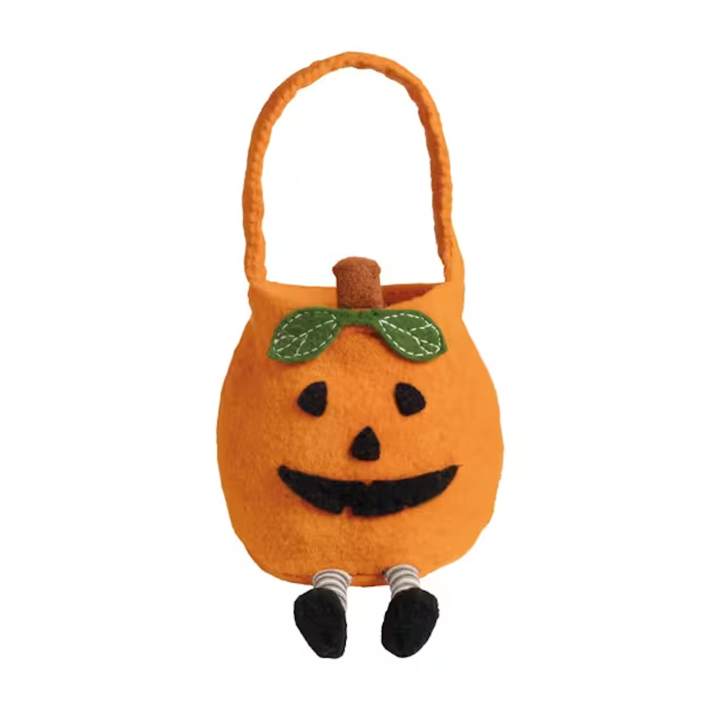 Orange pumpkin felt treat bucket with a jack-o'-lantern face, handle, and dangling striped legs.