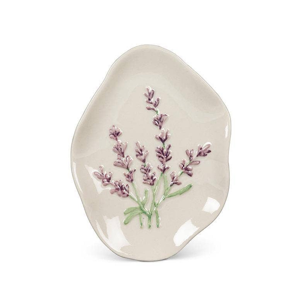 Off-white organic ceramic dish decorated with raised lavender sprigs and green stems.