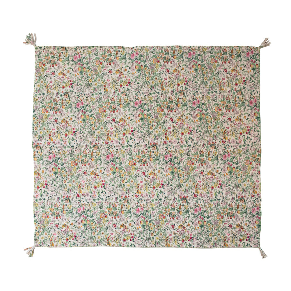 Floral quilted cotton throw blanket with kantha stitching and corner tassels on a white background.