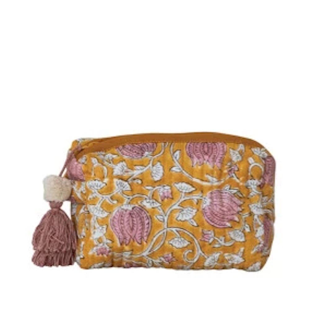 Quilted cotton floral zip pouch in yellow and pink with a decorative tassel on a white background.