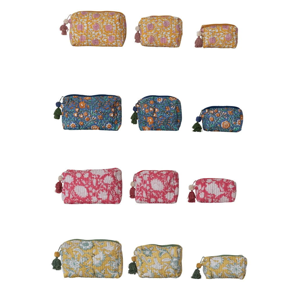 Quilted cotton voile floral zip pouches with tassels in various sizes and colors, perfect for travel and organization.