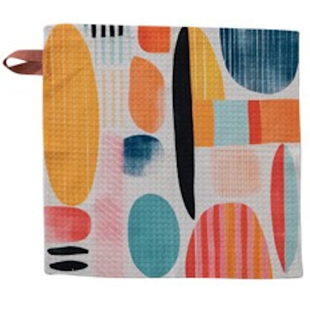 Square dish cloth with a waffle texture featuring an abstract pattern of colorful geometric shapes and a hanging loop.