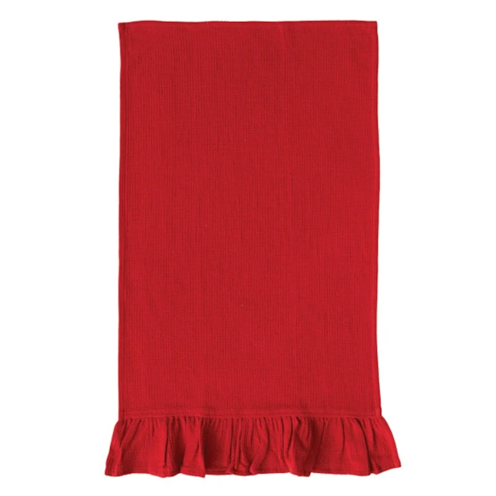 Flat-lay view of a solid red waffle-weave kitchen towel featuring a ruffled bottom trim.