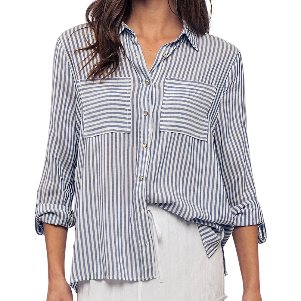 A person wearing a blue and white vertical striped, relaxed-fit button-down shirt with chest pockets.