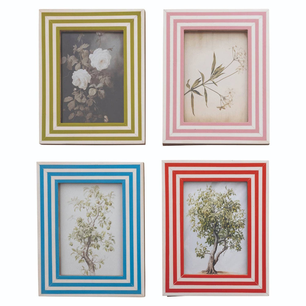 Four rectangular picture frames with striped inlaid borders in green, pink, blue, and red.