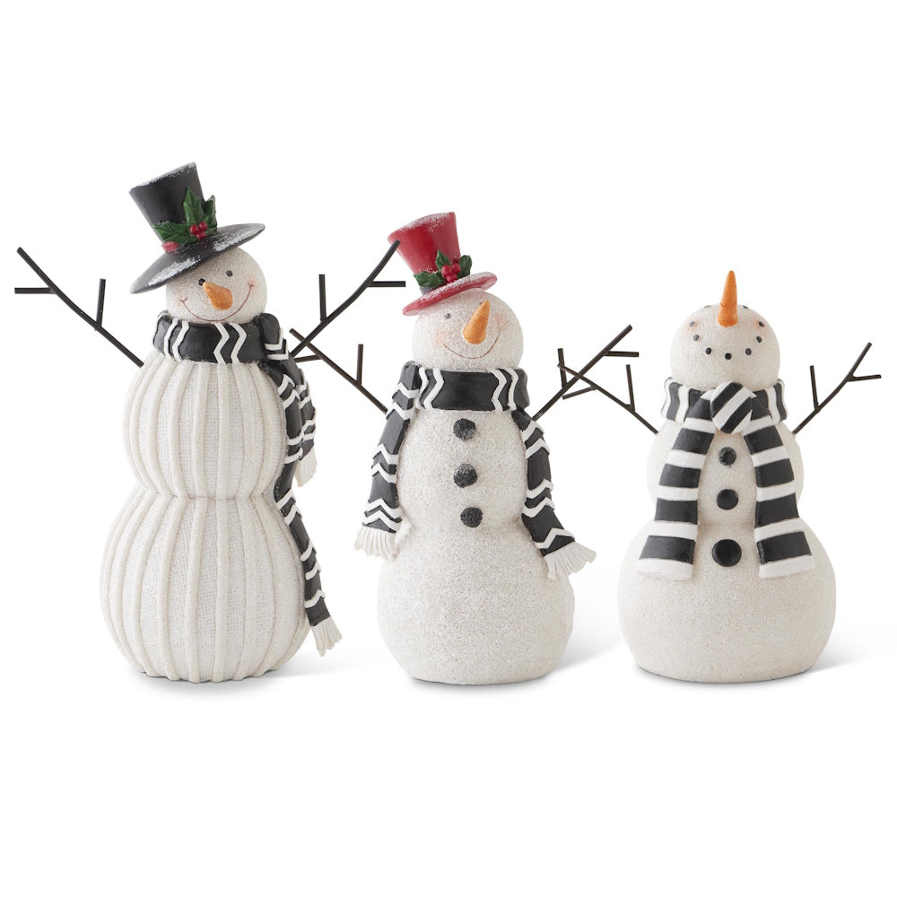 Set of 3 white resin snowman figurines with black and white scarves standing against a white background.