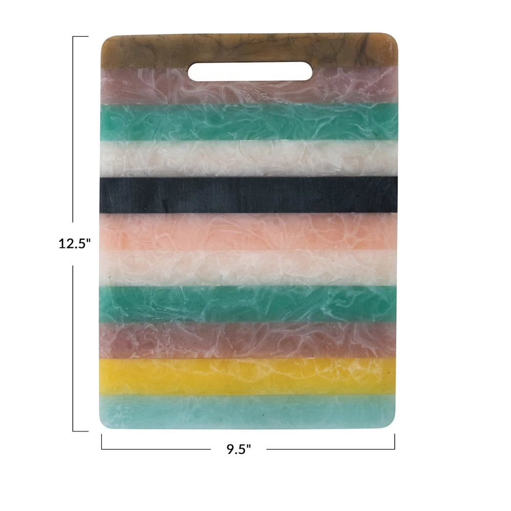 Colorful 12.5x9.5 striped resin cutting board with handle, featuring marble-like patterns in teal, pink, and yellow.