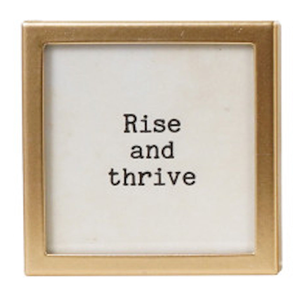 Square gold-framed magnet with text "Rise and thrive".