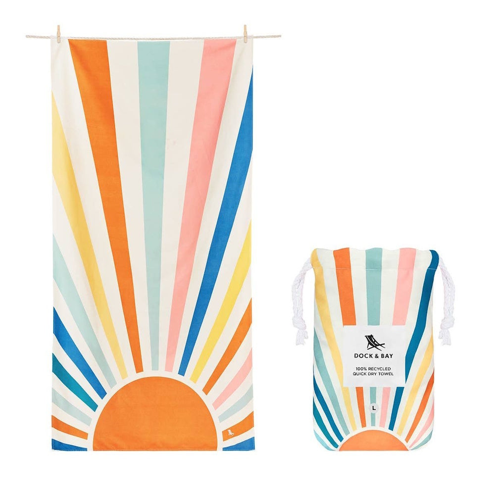 Dock & Bay quick dry towel and matching pouch with a colorful, pastel rising sun and striped design.