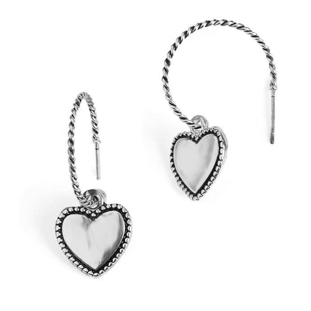 Silver rope detail dangle heart earrings on white background.