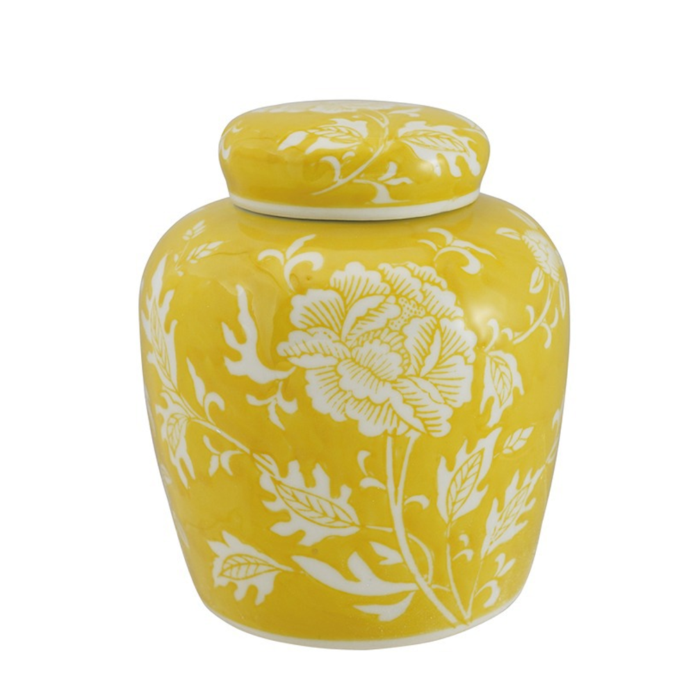 Yellow ginger jar with a white floral pattern and lid. Decorative stoneware jar for home decor and storage.