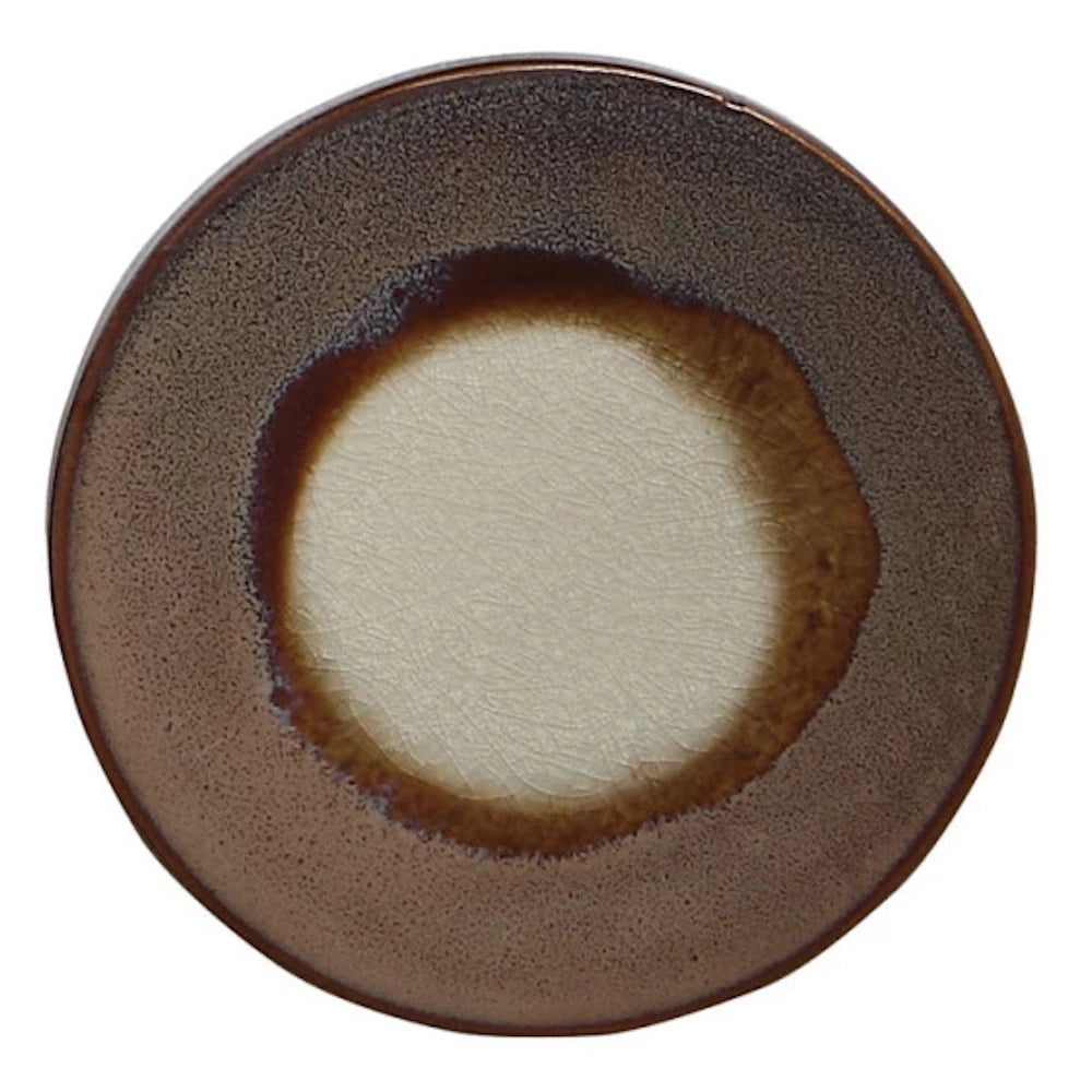 Round stoneware trivet with brown reactive glaze and white crackle center, rustic kitchen decor for hot dishes.