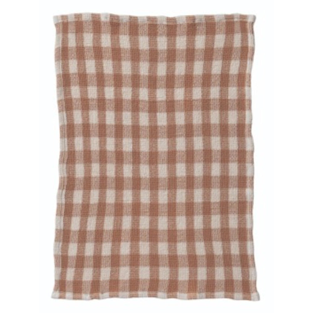 Waffle-weave kitchen towel with a beige and terracotta brown gingham check pattern.