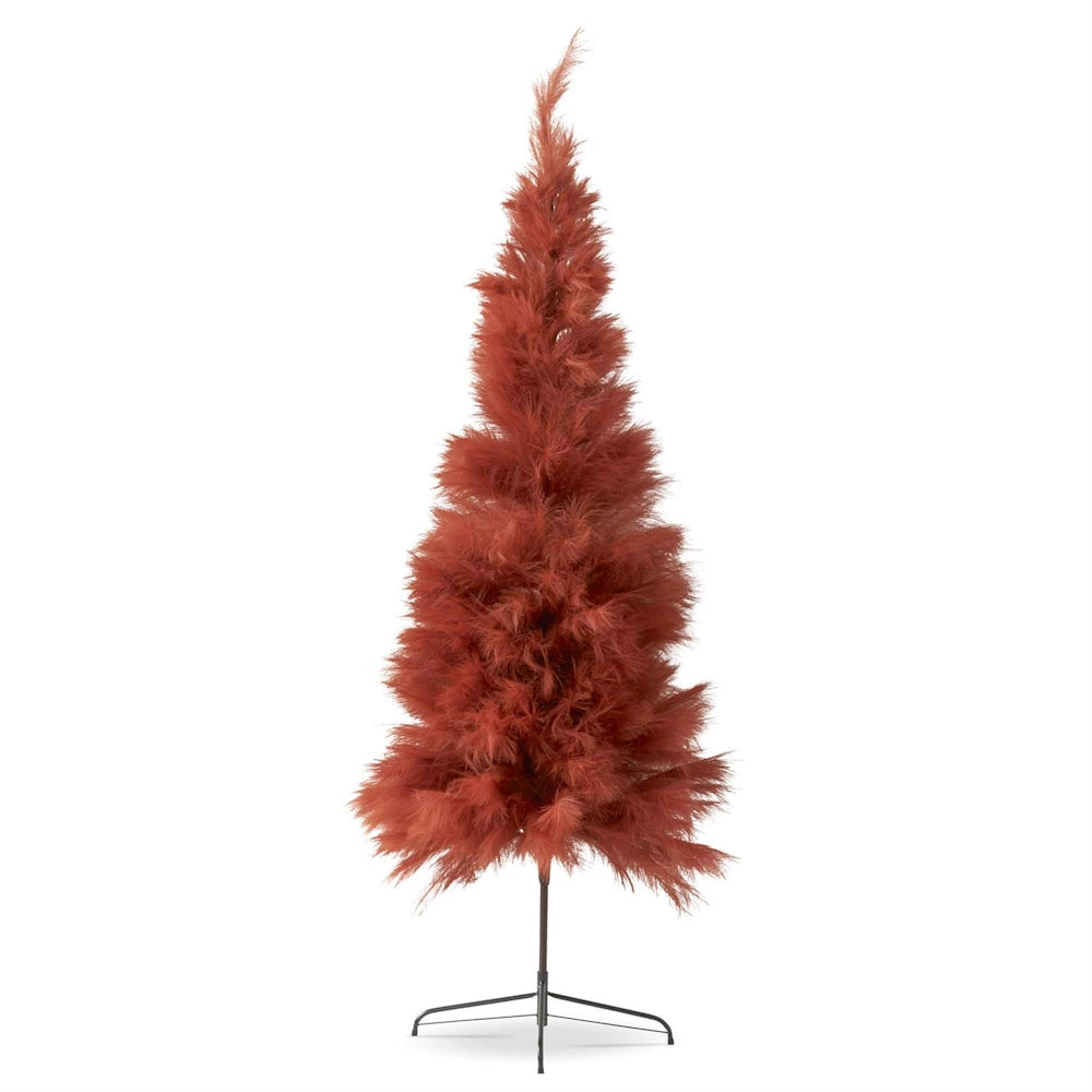 Tall rust-orange artificial pampas grass tree on a black metal stand.